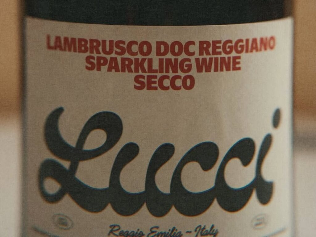 Ashley Graham debuts in wine with Lucci, a dry Lambrusco crafted with Medici Ermete, bringing Emilia’s red bubbles to the US market.